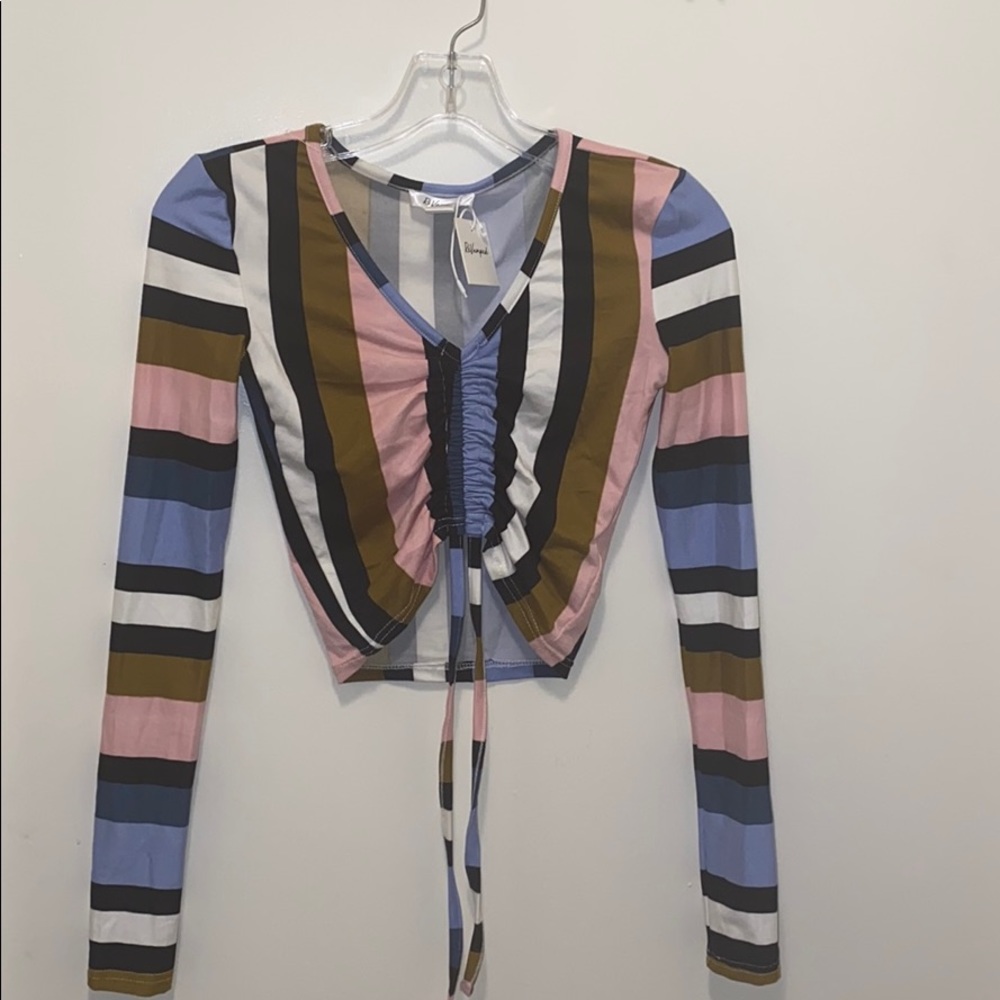 BRAND NEW LONG SLEEVE TOP WITH DRAWSTRING SIZE XS